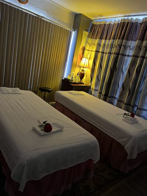 Couples massage room with two tables